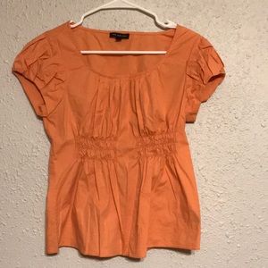 The limited peach shirt